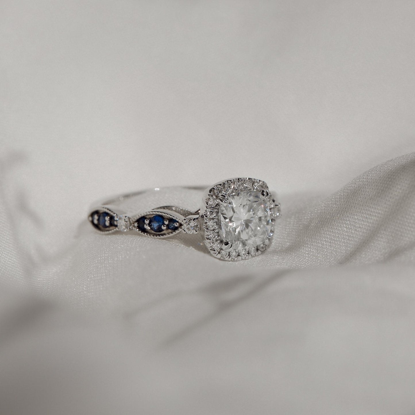 Sapphire Eyelet Moissanite and Diamond Halo Ring